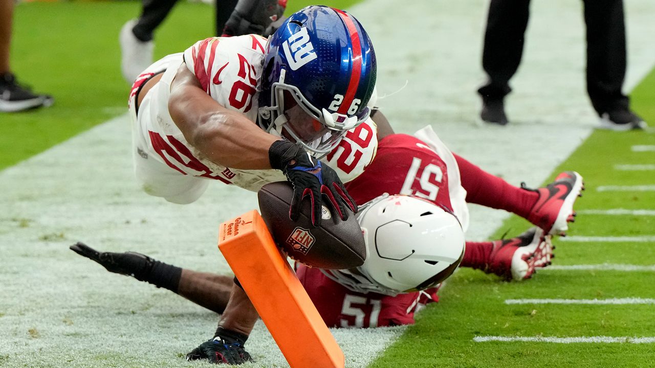 Giants outlast Vikings 31-24 for 1st playoff win in 11 years