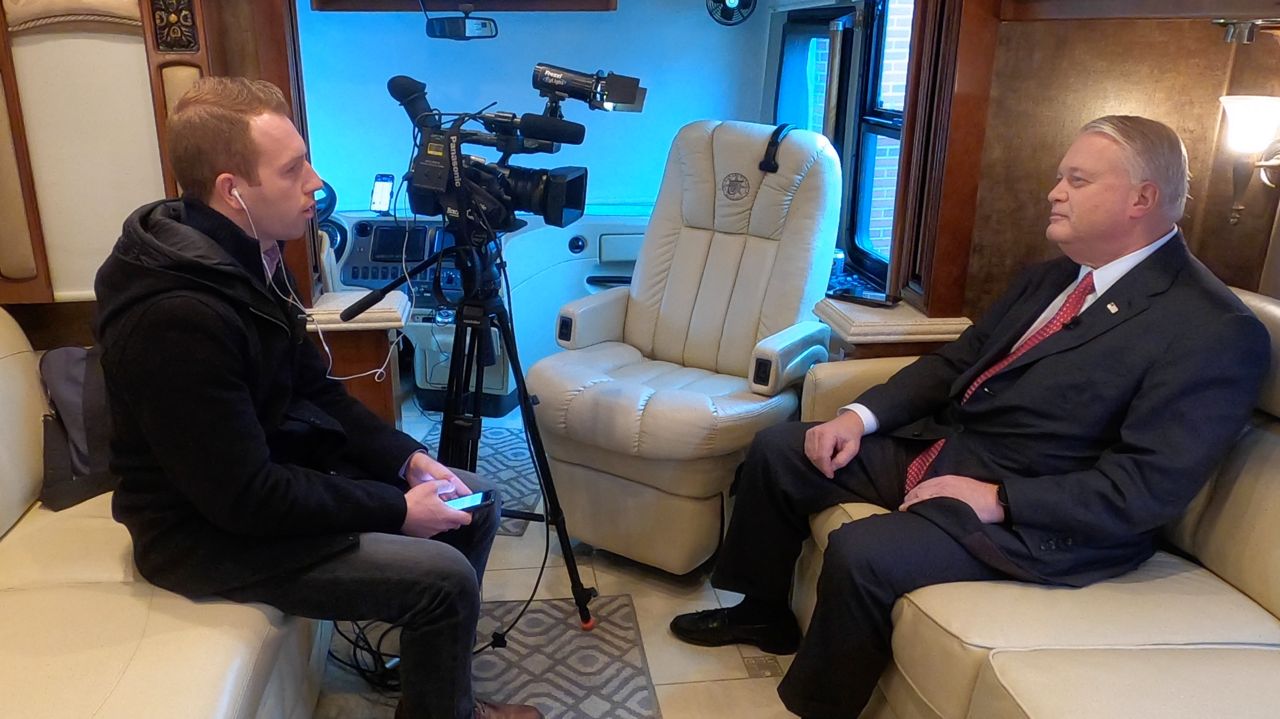 Ohio U.S. Senate candidate Mike Gibbons (R) sits for an interview with Spectrum News on his campaign bus.