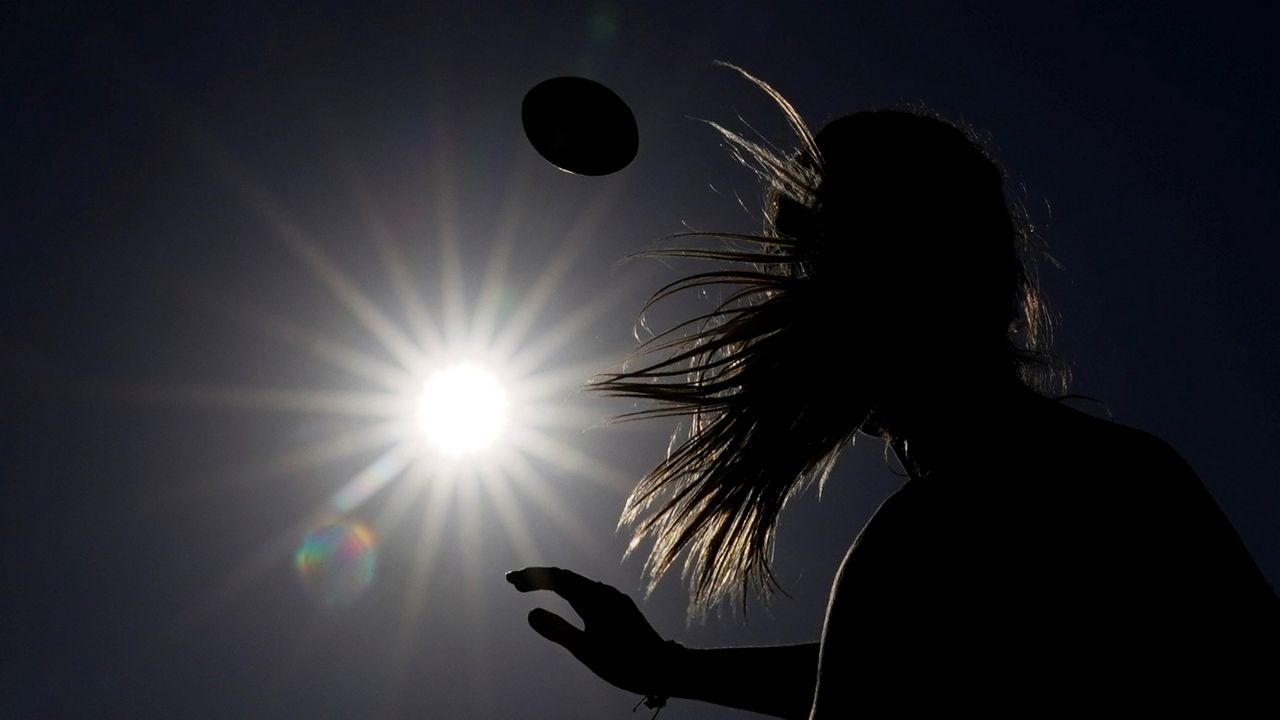 Shale Harris, 15, throws a pass as she tries out for the Redondo Union High School girls flag football team on Thursday, Sept. 1, 2022, in Redondo Beach, Calif. Southern California high school sports officials will meet on Thursday, Sept. 29, to consider making girls flag football an official high school sport. This comes amid growth in the sport at the collegiate level and a push by the NFL to increase interest. (AP Photo/Ashley Landis)