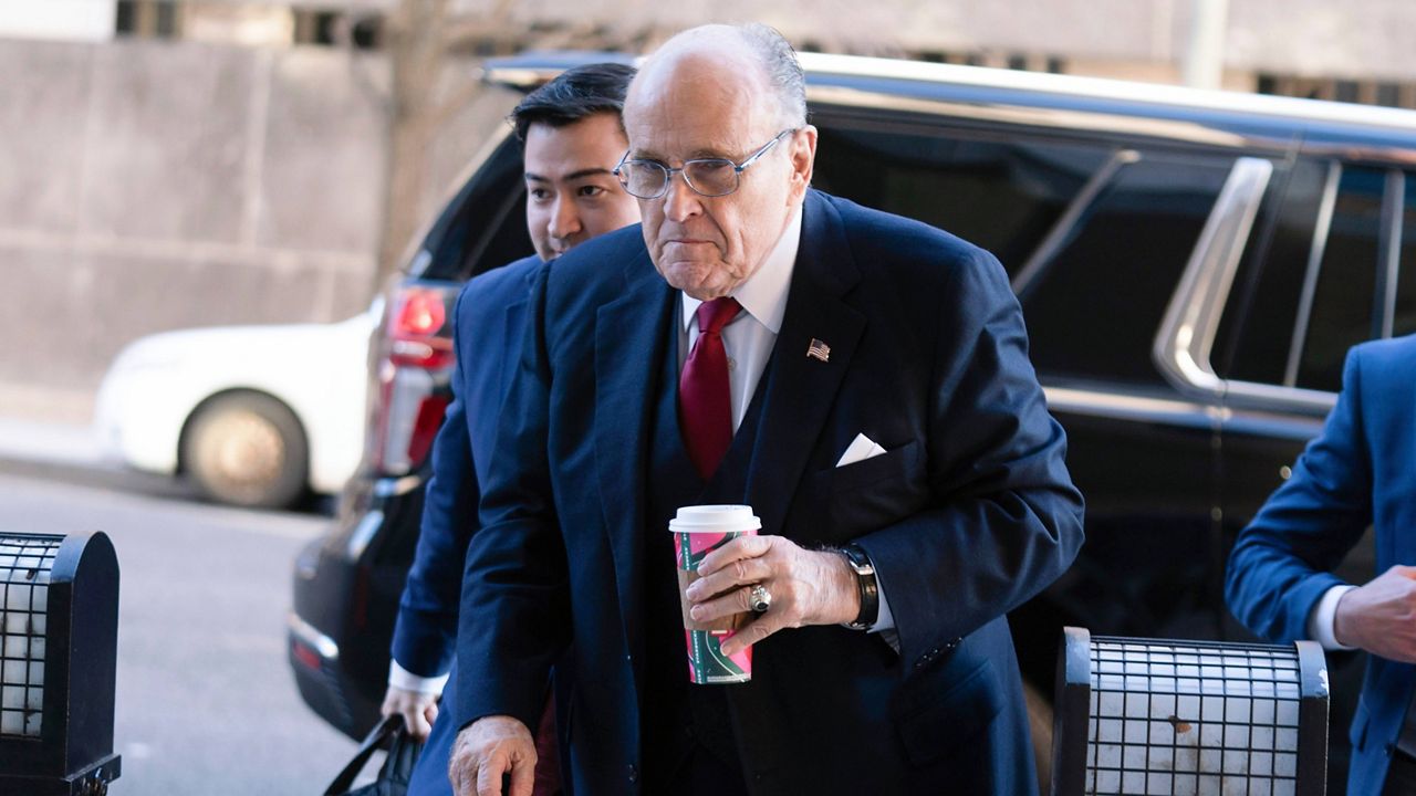 Former New York Mayor Rudy Giuliani arrives at the federal courthouse in Washington, Friday, Dec. 15, 2023. (AP Photo/Jose Luis Magana)