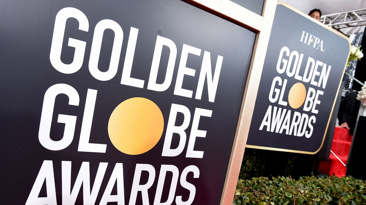In this Jan. 6, 2019 file photo, Golden Globes signage appears on the red carpet at the 76th annual Golden Globe Awards in Beverly Hills, Calif. The Hollywood Foreign Press Association says the ceremony will be held Feb. 28. (Photo by Jordan Strauss/Invision/AP, File)