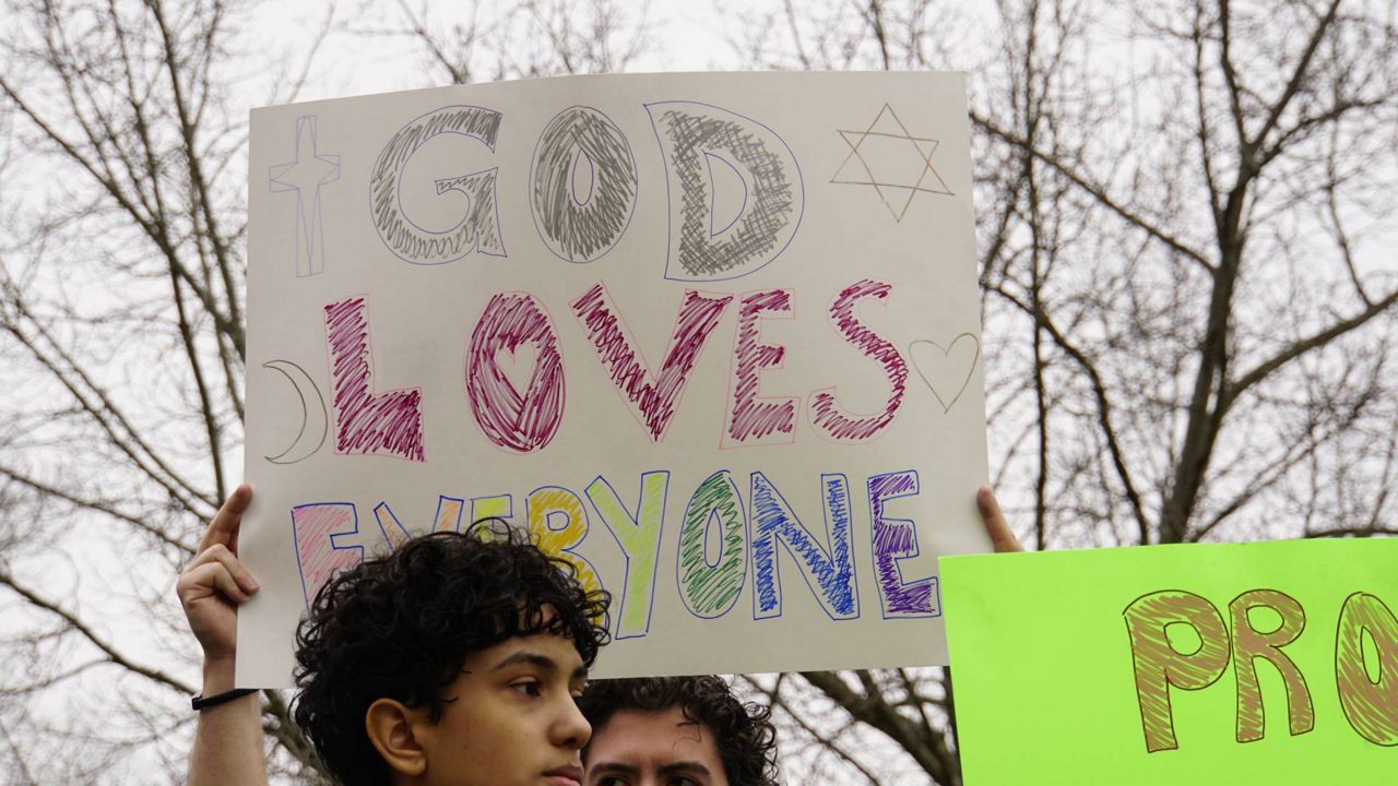 pro-lgbt protesters rally in Frankfort