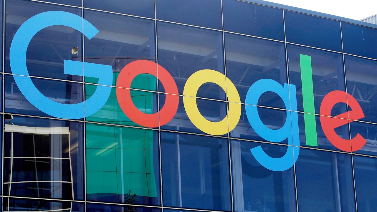 A sign is shown on a Google building at their campus in Mountain View, Calif., on Sept. 24, 2019. Google is among the tech companies that have committed to rules aimed at preventing AI-generated child sexual abuse material. (AP Photo/Jeff Chiu, File)