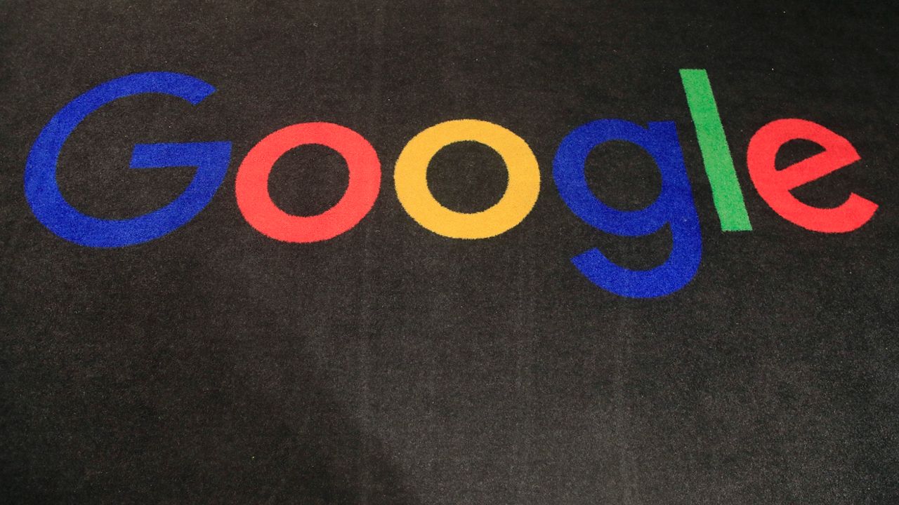 In this Monday, Nov. 18, 2019 file photo, the Google logo is displayed on a carpet at Google France in Paris. Google will automatically purge information about users who visit abortion clinics or other places that could trigger legal problems now that the U.S. Supreme Court has opened the door for states to ban the termination of pregnancies. (AP Photo/Michel Euler, File)