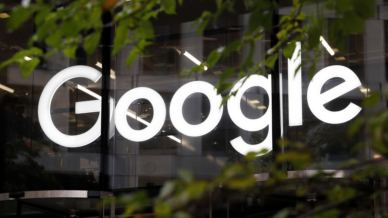 The Google logo is displayed at its offices in Granary Square in London. (AP Photo/Alastair Grant, File)