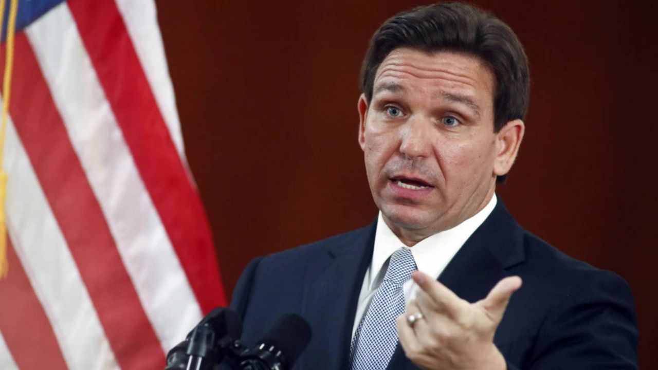 Florida Gov. Ron DeSantis answers questions from the media in the Florida Cabinet following his State of the State address during a joint session of the Senate and House of Representatives on March 7, 2023, at the state Capitol in Tallahassee, Fla. (AP Photo/Phil Sears, File)