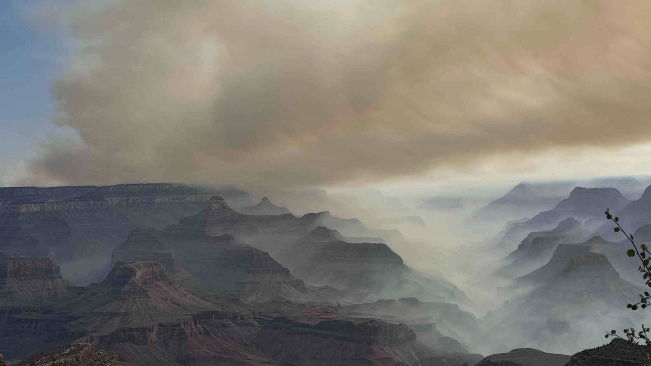 This photo provided by Caren Carney shows the family's view of fires over the Grand Canyon after they had to evacuate Grand Canyon Lodge, a historic lodge on the North Rim, in northern Arizona, Thursday, July 10, 2025. (Caren Carney via AP)