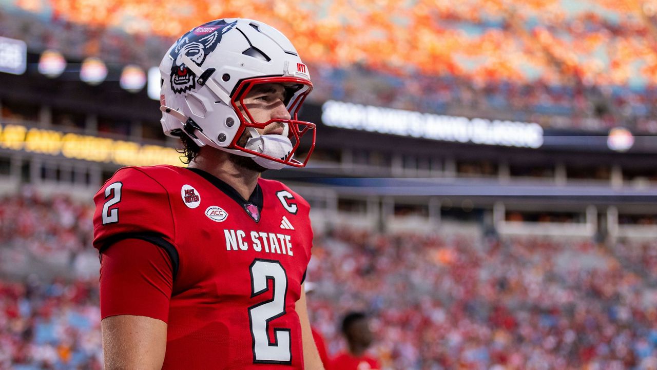 N.C. State quarterback Grayson McCall prepares for an NCAA college football game, Sept. 8, 2024, in Charlotte, N.C. (AP File Photo/Scott Kinser)