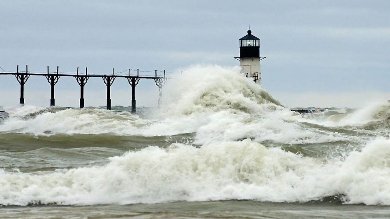 Waves crash along the shoreline of Lake Michigan