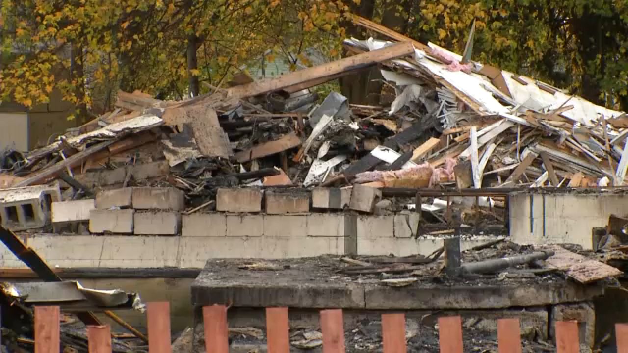 Fire investigators continue to look into the source of a house explosion on Stone Road in Greece on Monday morning. (Spectrum News 1)