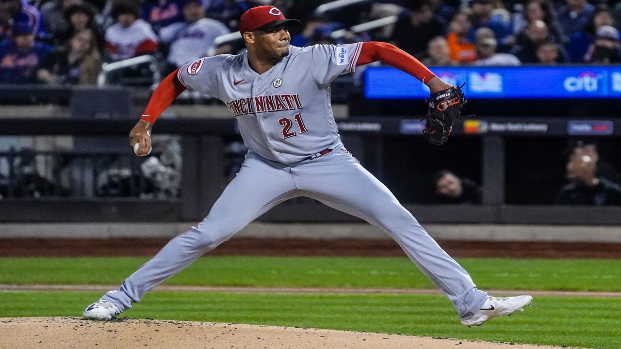 The Cincinnati Reds baseball team uniforms for the 2019 season are  displayed at Great American Ball Park, Monday, Jan. 7, 2019, in Cincinnati.  The Reds will play games in 15 sets of