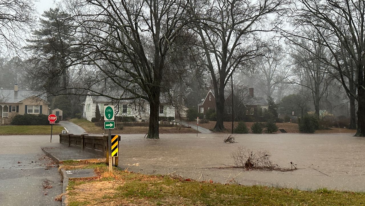 Heavy rains Tuesday afternoon caused flooding in Latham Park in Greensboro as a powerful storm system drove through North Carolina. (Spectrum News 1/Sydney McCoy)