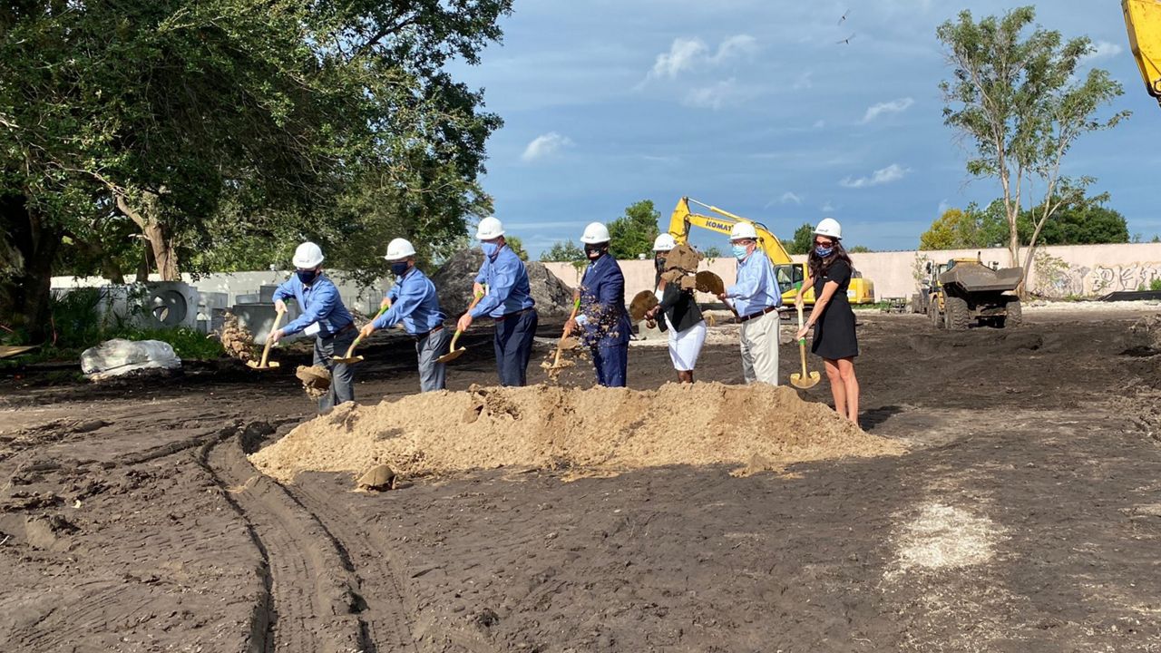 Officials break ground at the future site of Madison Landing, an affordable housing community for seniors. (Photo: Molly Duerig)