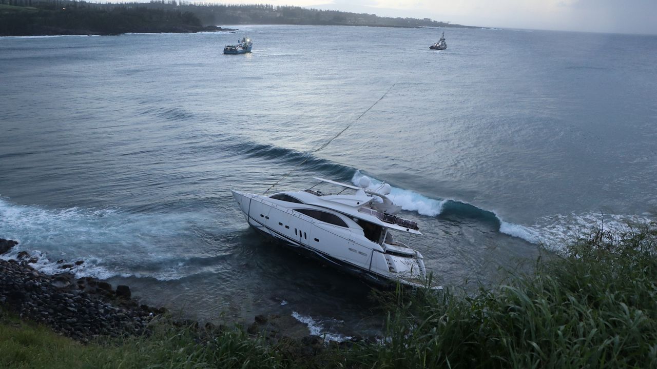 After two earlier failed attempts, salvage operations for the grounded yacht are scheduled to continue this weekend, weather and ocean conditions permitting. (Photo courtesy of Hawaii Department of Land and Natural Resources)