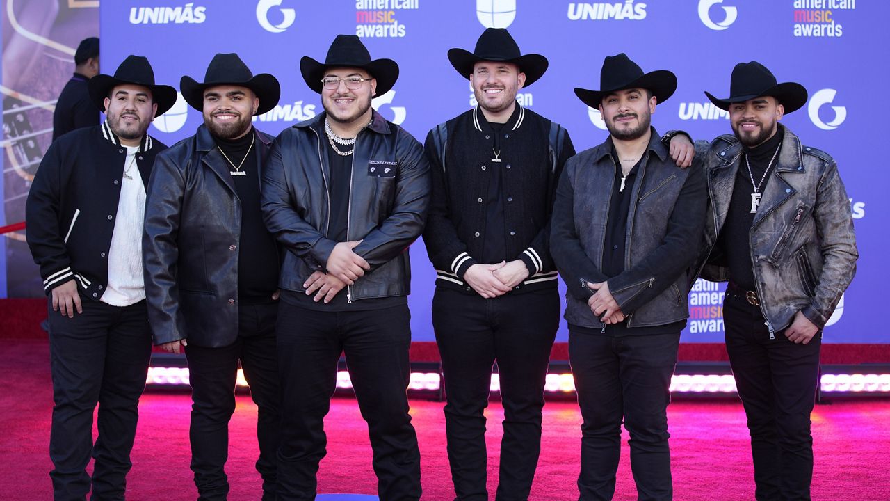 Grupo Frontera arrives at the Latin American Music Awards in Las Vegas on April 20, 2023. Regional Mexican music has become a global phenomenon, topping music charts, breaking streaming records and reaching new audiences as it crosses borders. Their sophomore album “Jugando Que No Pasa Nada" releases on Friday. (AP Photo/John Locher, File)