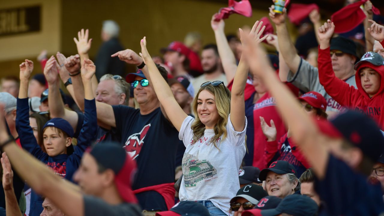 Fans cheer in the fifth inning during Game 1 of baseball's AL Division Series between the Detroit Tigers and the Cleveland Guardians, Saturday, Oct. 5, 2024, in Cleveland.