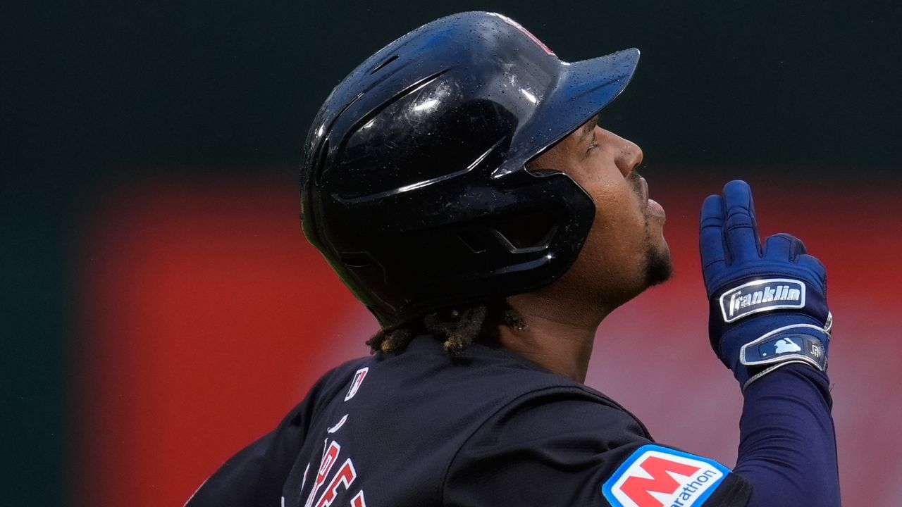 Cleveland Guardians' José Ramírez celebrates after hitting a two-run home run against the Oakland Athletics during the first inning of a baseball game Friday, March 29, 2024, in Oakland, Calif.