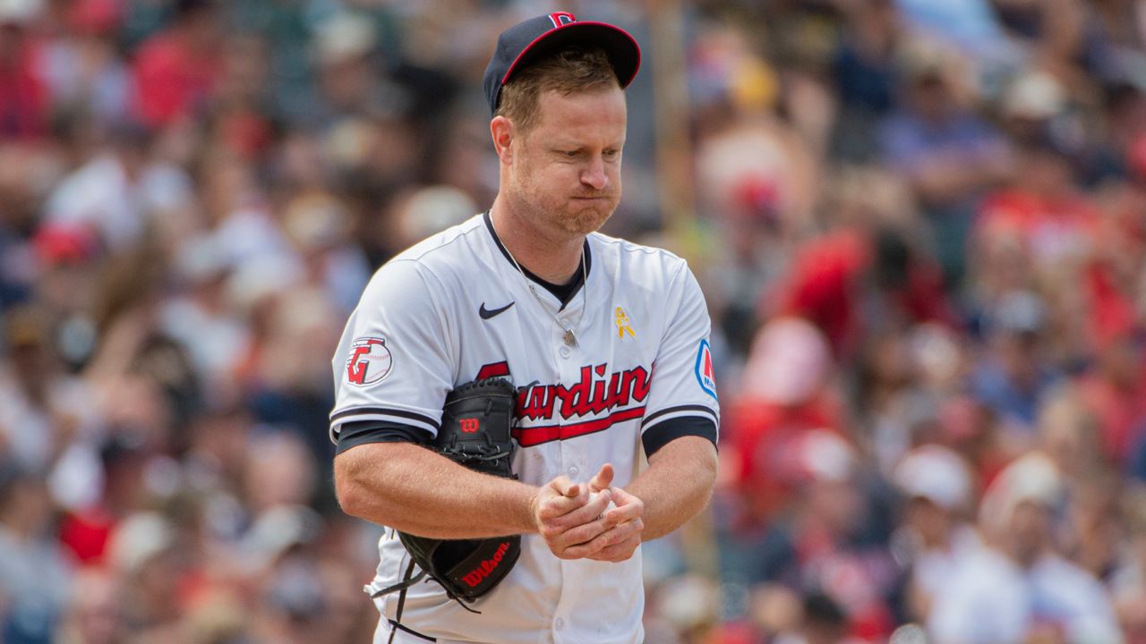 Cleveland Guardians starter Alex Cobb reacts between pitches during the seventh inning of a baseball game against the Pittsburgh Pirates in Cleveland, Sunday, Sept. 1, 2024.