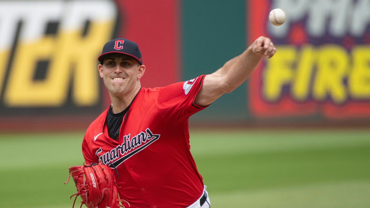 Cleveland Guardians starting pitcher Matthew Boyd delivers against the Texas Rangers during the first inning of a baseball game in Cleveland, Sunday, Aug. 25, 2024.