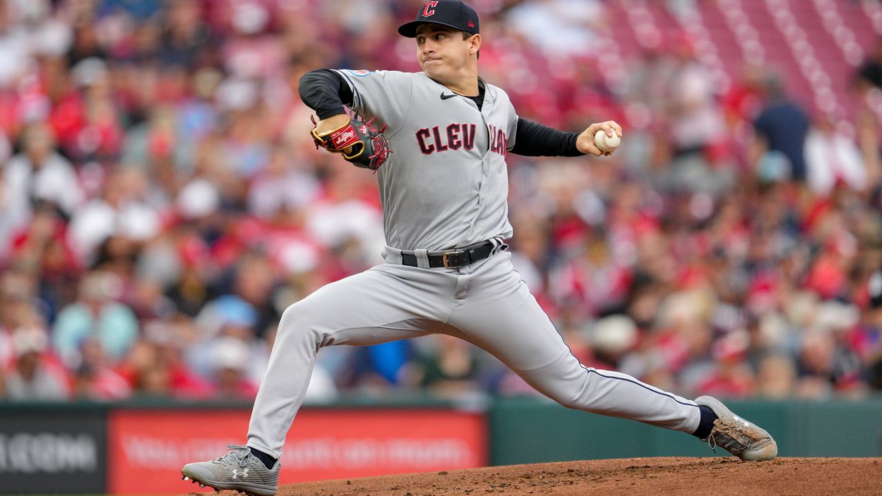 Cleveland Guardians starting pitcher Logan Allen throws against the Cincinnati Reds in the first inning of a baseball game in Cincinnati, Tuesday, Aug. 15, 2023. (AP Photo/Jeff Dean)