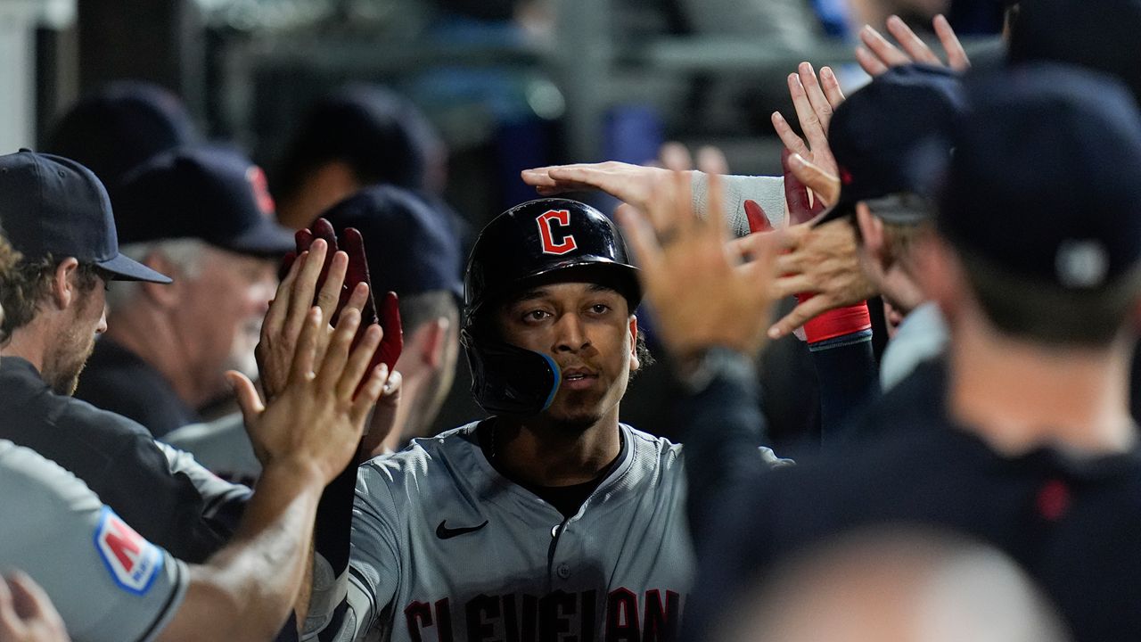 Cleveland Guardians' Bo Naylor celebrates after hitting a home run during the fourth inning of a baseball game against the Chicago White Sox, Monday, Sept. 9, 2024, in Chicago. (AP Photo/Erin Hooley)