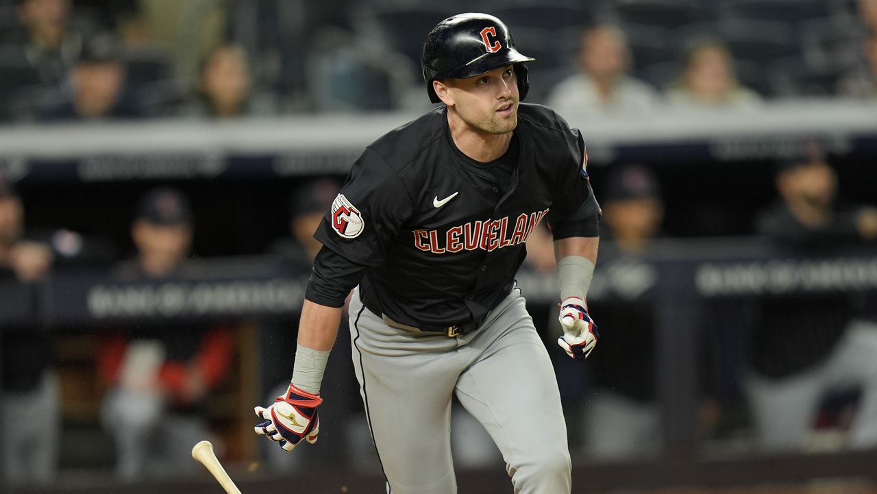 Cleveland Guardians' Lane Thomas looks after and RBI double during the 12th inning of a baseball game against the New York Yankees at Yankee Stadium Tuesday, Aug. 20, 2024, in New York. (AP Photo/Seth Wenig)