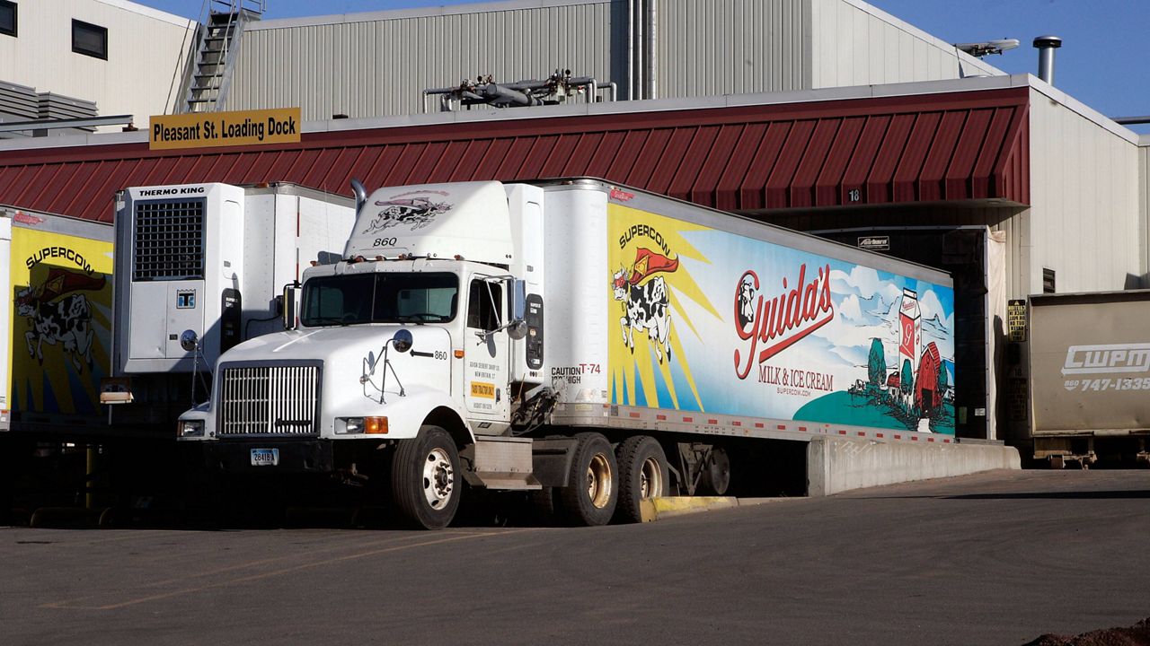 A Guida's Dairy truck waits at a loading dock at the company's New Britain, Conn., facility. (AP Photo/Bob Child, File)