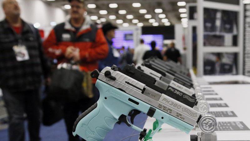 FILE - In this May 4, 2018, file photo, handguns are on display at the The National Rifle Association convention in Dallas. Texas is edging closer to becoming the largest state in the country to allow people to carry handguns without a license. (AP Photo/Sue Ogrocki, File)
