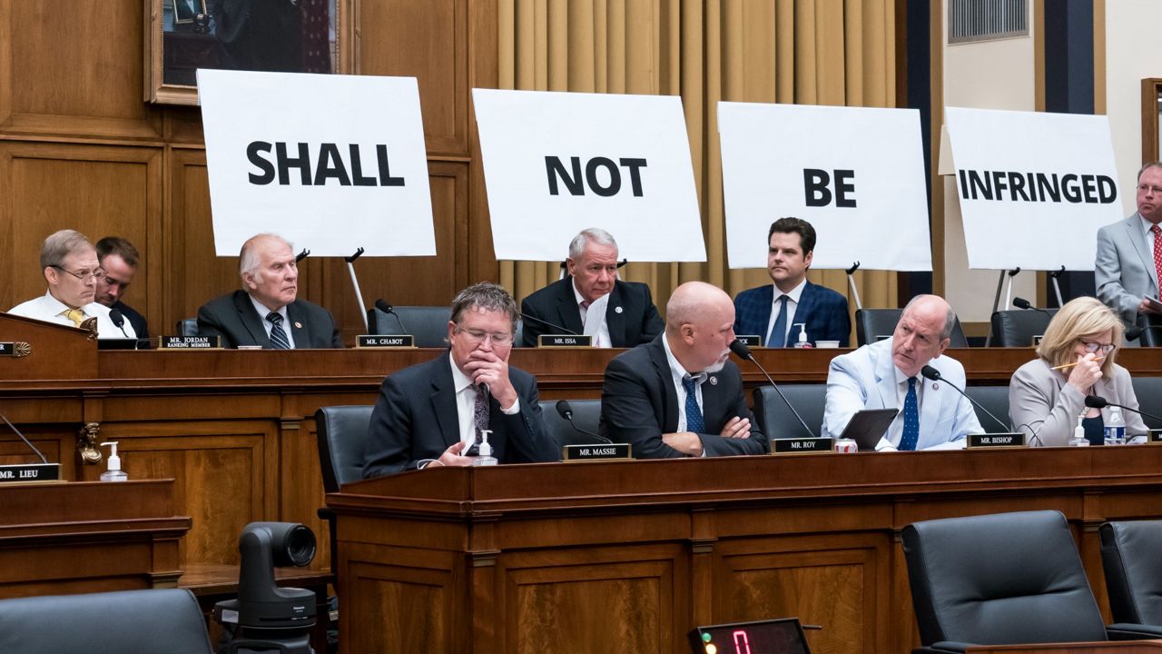 Republicans on the House Judiciary Committee use charts Wednesday to press their defense of the Second Amendment during a markup on a bill that would ban semiautomatic weapons and large-capacity magazines. (AP Photo/J. Scott Applewhite)