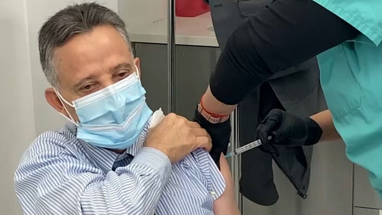 Man being vaccinated