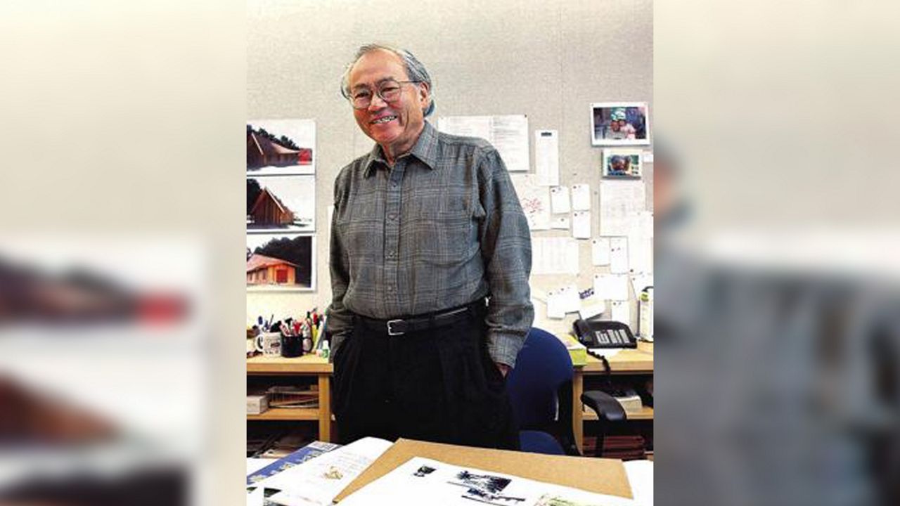 Gyo Obata, poses for a photo in his St. Louis, Mo. office, Dec. 18, 1998. Obata, an architect whose designs included sports and entertainment arenas, airports and a presidential library, has died. His family says Obata died Tuesday, March 8, 2022 in St. Louis at age 99. A cause of death was not announced. (Rich Saal/The State Journal-Register via AP)