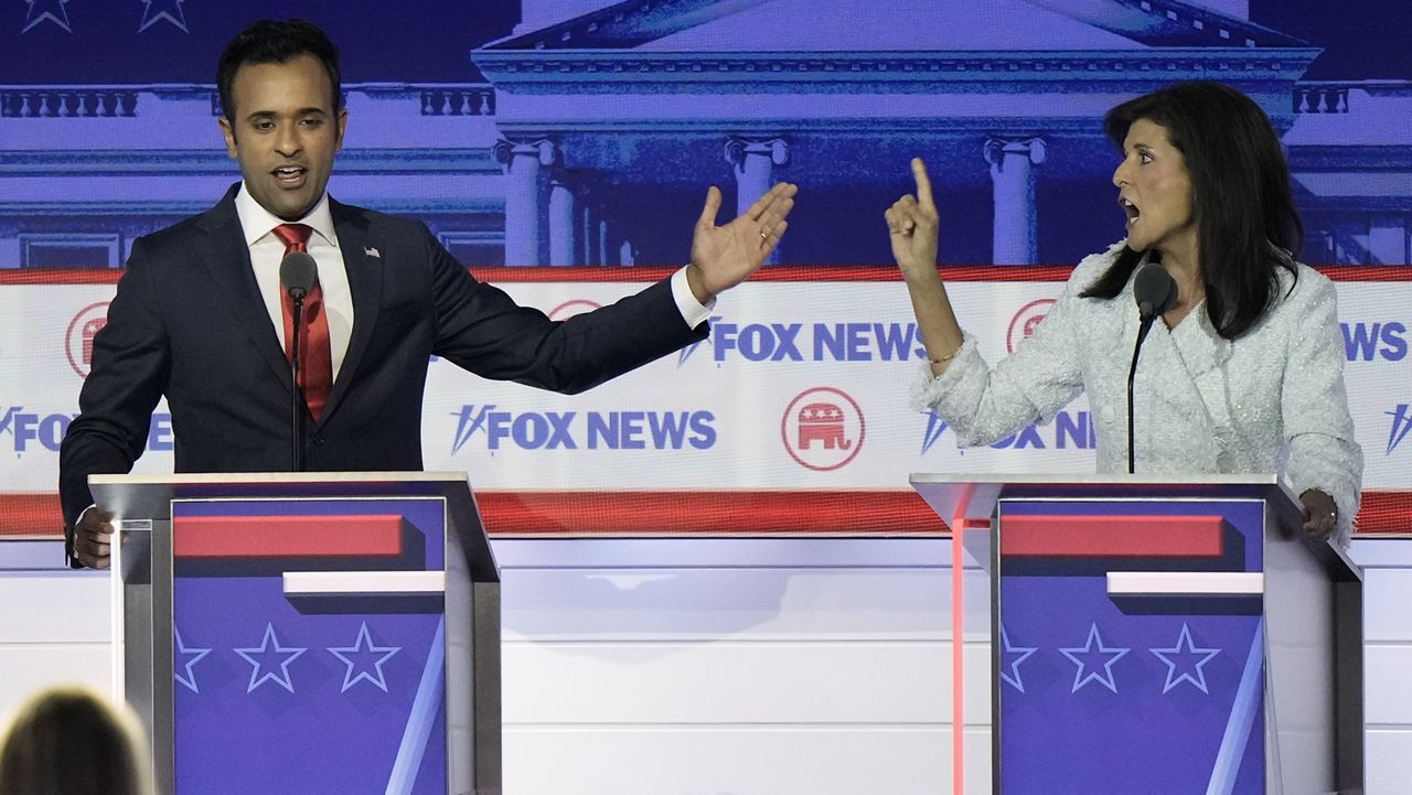 Businessman Vivek Ramaswamy and former U.N. Ambassador Nikki Haley argue during the first Republican presidential primary debate on Aug. 23, 2023 in Milwaukee. (AP Photo/Morry Gash)