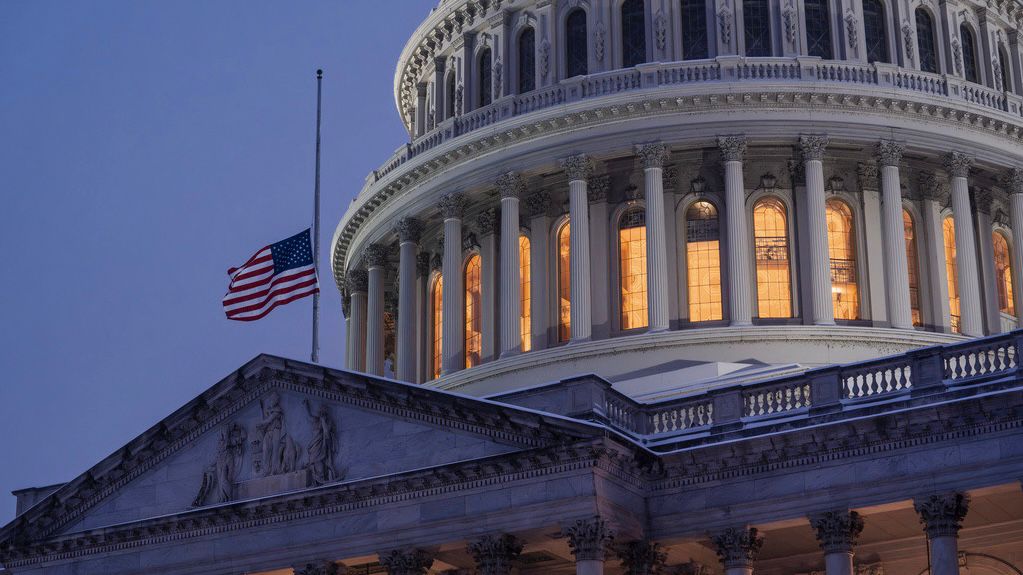 half-mast flag at U.S. Capitol