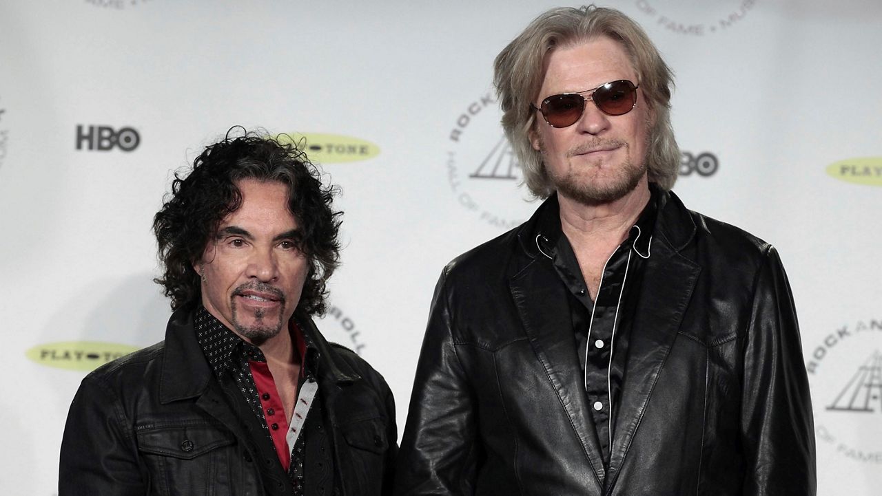 Hall of Fame Inductees, Hall & Oates, John Oates and Daryl Hall appear in the press room at the 2014 Rock and Roll Hall of Fame Induction Ceremony on April, 10, 2014, in New York. Hall has sued his longtime music partner John Oates. (Photo by Andy Kropa/Invision/AP)