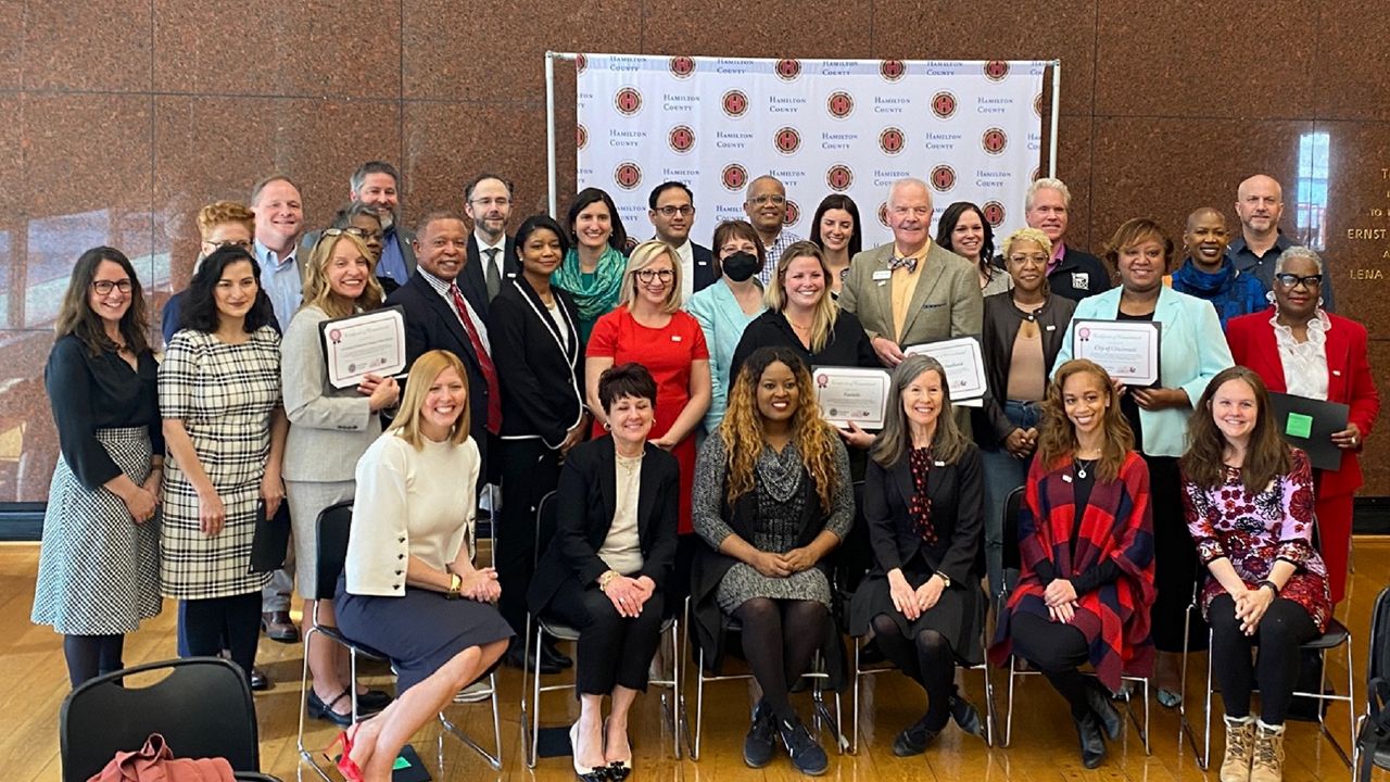 This group represents the initial group to sign the Pay Equity Commitment presented by the Hamilton County Commission on Women and Girls. (Casey Weldon/Spectrum News 1)