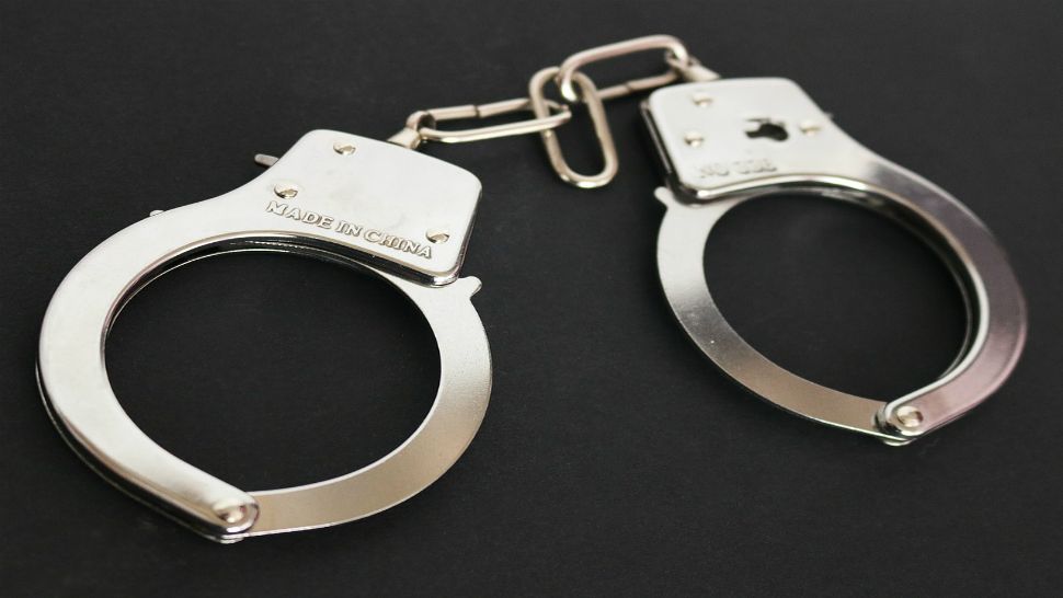 A pair of handcuffs. (Spectrum News 1/FILE)
