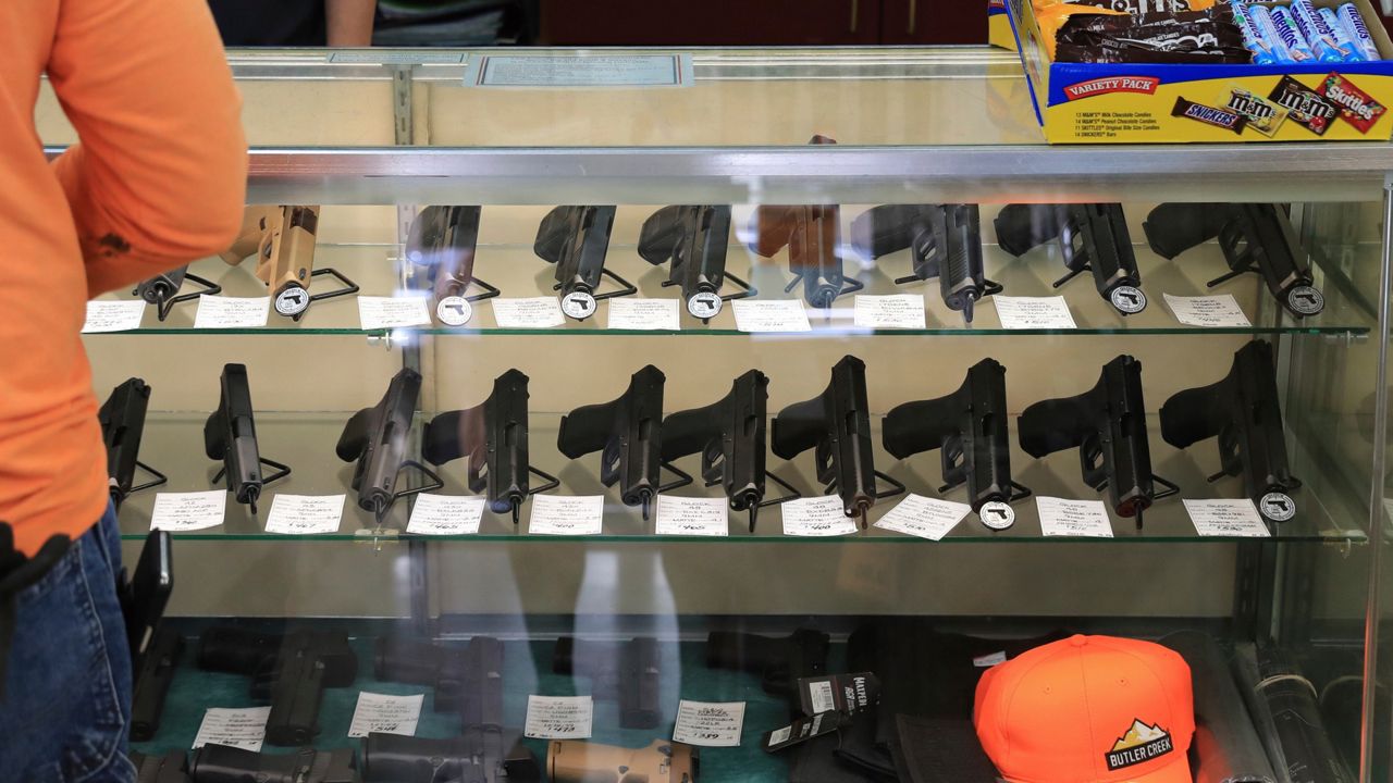 Handguns are displayed at a gun shop on June 23, 2022, in Honolulu. (AP Photo/Marco Garcia, File)