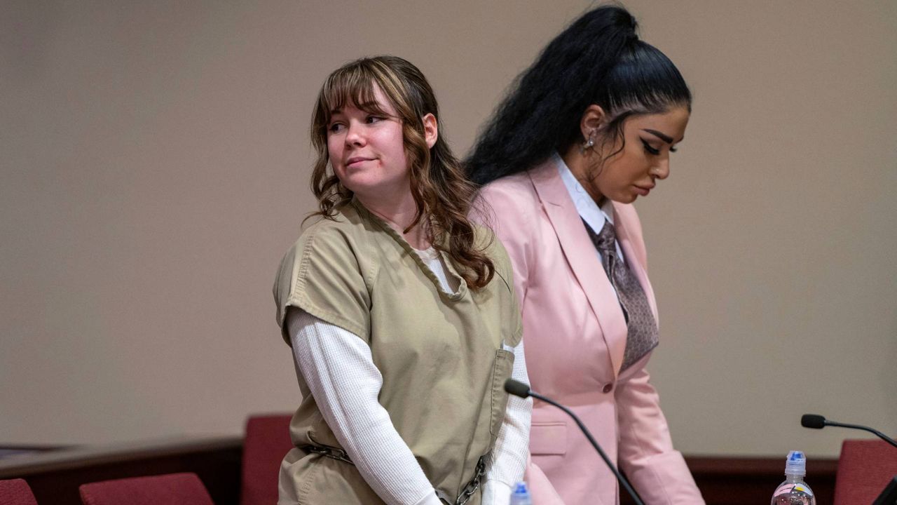 Hannah Gutierrez Reed, left, and paralegal Carmella Sisneros await sentencing in state district court in Santa Fe, New Mexico, on Monday. (Eddie Moore/The Albuquerque Journal via AP, Pool)
