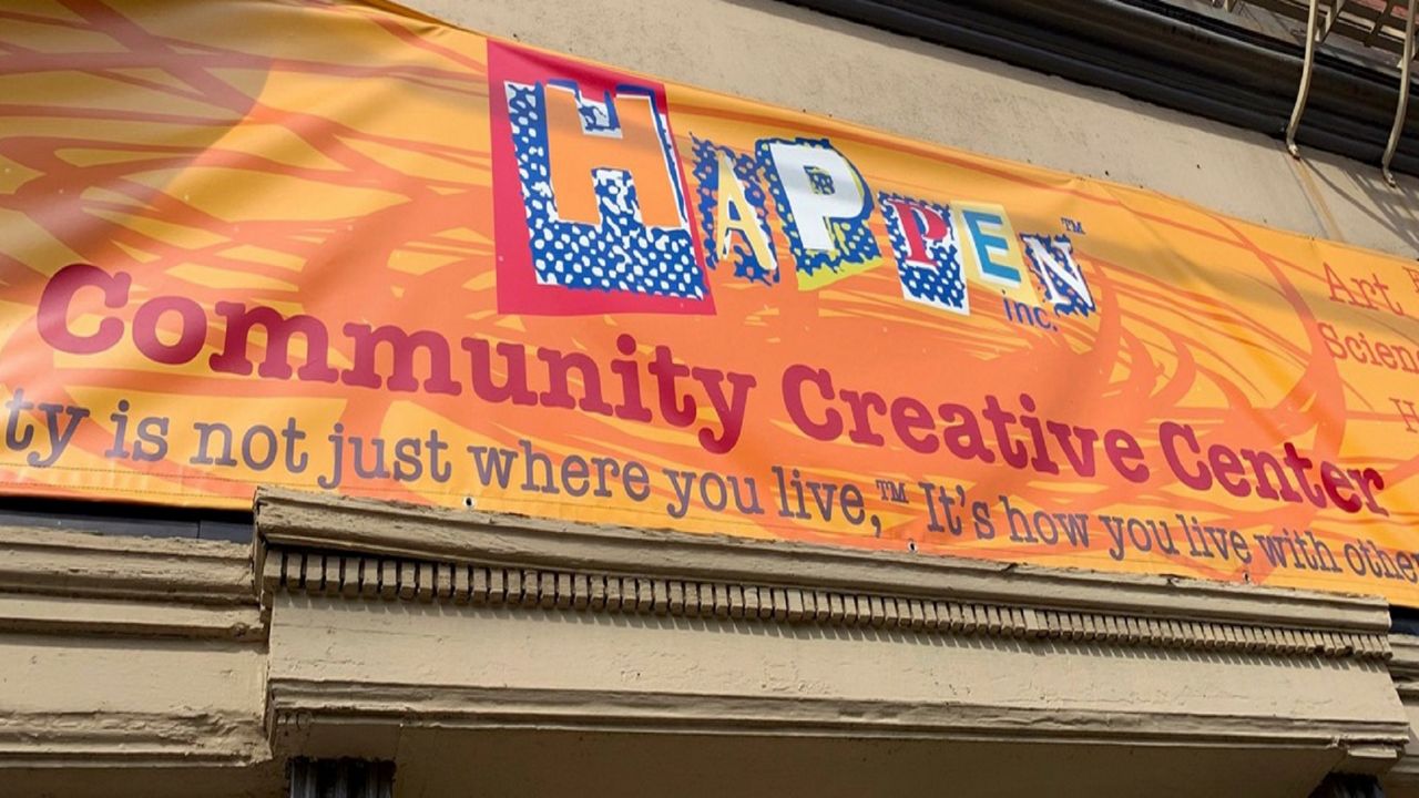 The sign at Happen, Inc., a community creative center in Cincinnati's Northside neighborhood. (Photo courtesy of Happen, Inc.)