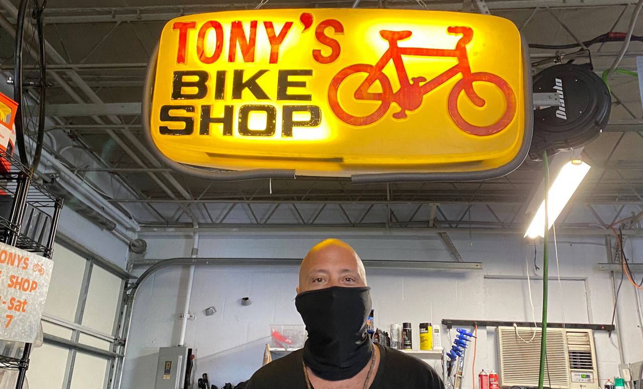 John Hill of Tony's Bike Shop says business is booming. (Photo by Scott Harrell)
