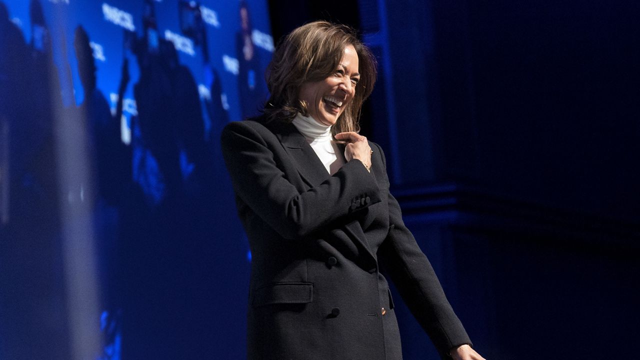 Vice President Kamala Harris reacts to applause as she makes a surprise appearance to speak to the National Black Caucus of State Legislators 48th annual Legislative Conference, Thursday, Dec. 5, 2024, in Washington. (AP Photo/Jacquelyn Martin)