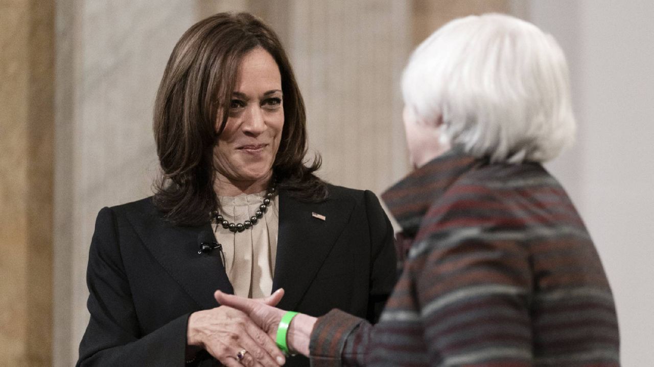 Vice President Kamala Harris shakes hands with Treasury Secretary Janet Yellen as they participate in the Freedman Bank Forum at the Treasury Department in Washington, Tuesday, Dec. 14, 2021. (AP Photo/Carolyn Kaster)