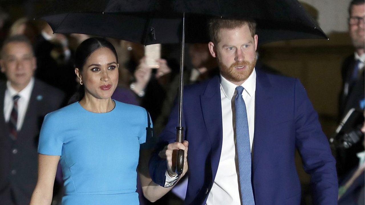 In this March 5, 2020, file photo, Britain's Prince Harry and Meghan, Duchess of Sussex, arrive at the annual Endeavour Fund Awards in London. In an interview with Oprah Winfrey, Prince Harry says the process of separating from royal life has been very difficult for him and his wife, Meghan. The interview special is scheduled to air March 7, 2021, on CBS and the following day in Britain. (AP Photo/Kirsty Wigglesworth, File)