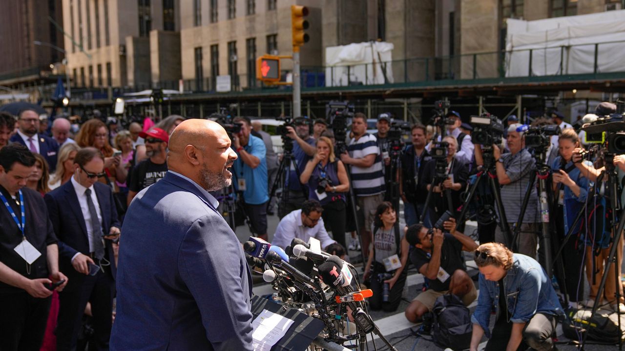 Former Capitol Police Officer Harry Dunn speaks to reporters across the street from former President Donald Trump's criminal trial in New York, Tuesday, May 28, 2024. (AP Photo/Seth Wenig)