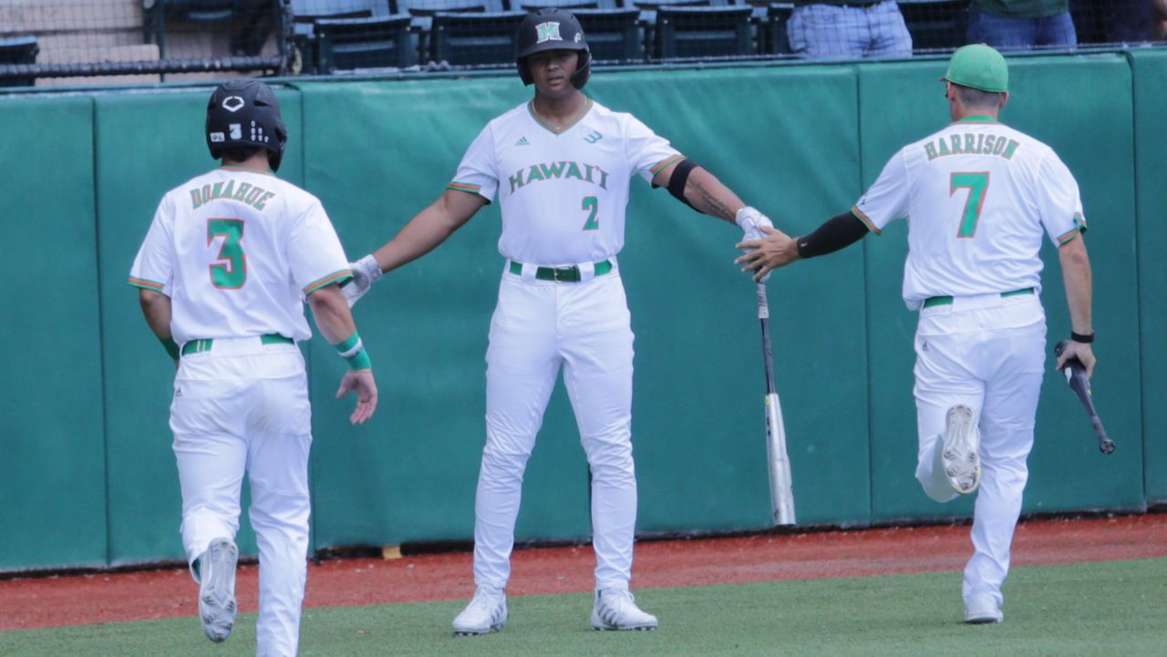 Hawaii center fielder Matt Wong, center, seen against Wright State in February, reached base six times Saturday at Cal State Fullerton. 