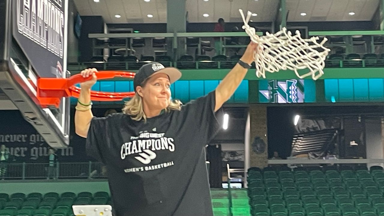 Hawaii coach Laura Beeman celebrated cutting down the net at a Big West tournament for the second time in her 10-year UH career on Saturday night.