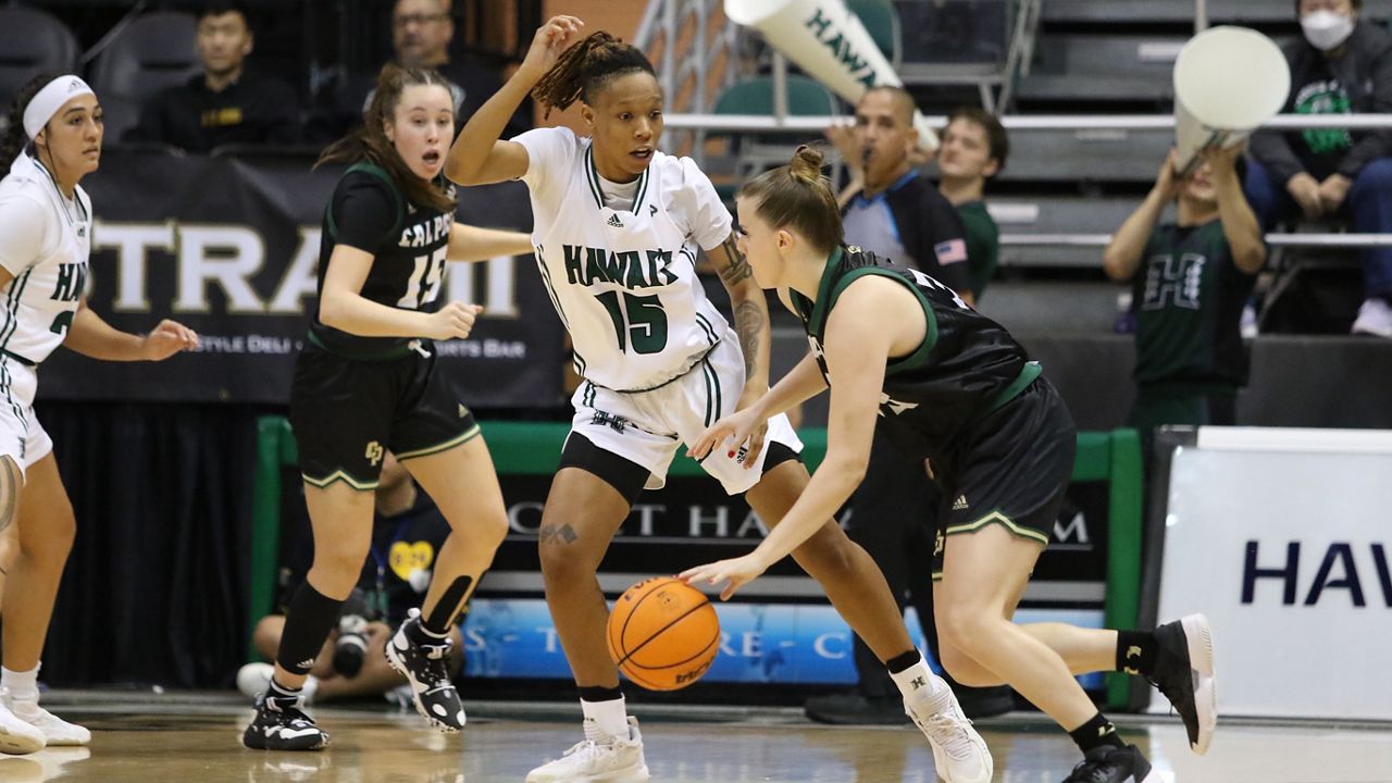 Hawaii forward Daejah Phillips (15) was one of five Rainbow Wahine players in double-figure scoring in a rout of Cal Poly on Saturday.