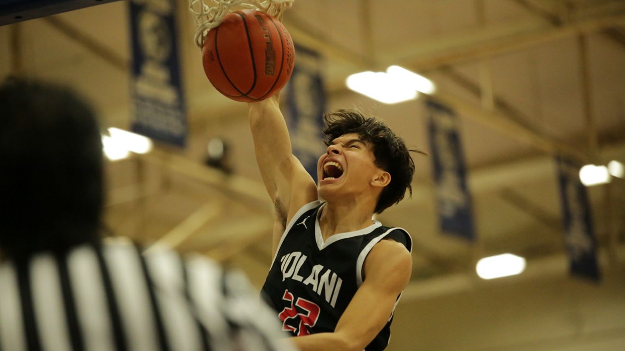 Iolani forward Luke Tobin threw down a one-handed dunk in the first half of the Raiders' 64-50 win over Kailua in the Surfriders Holiday Classic title game.