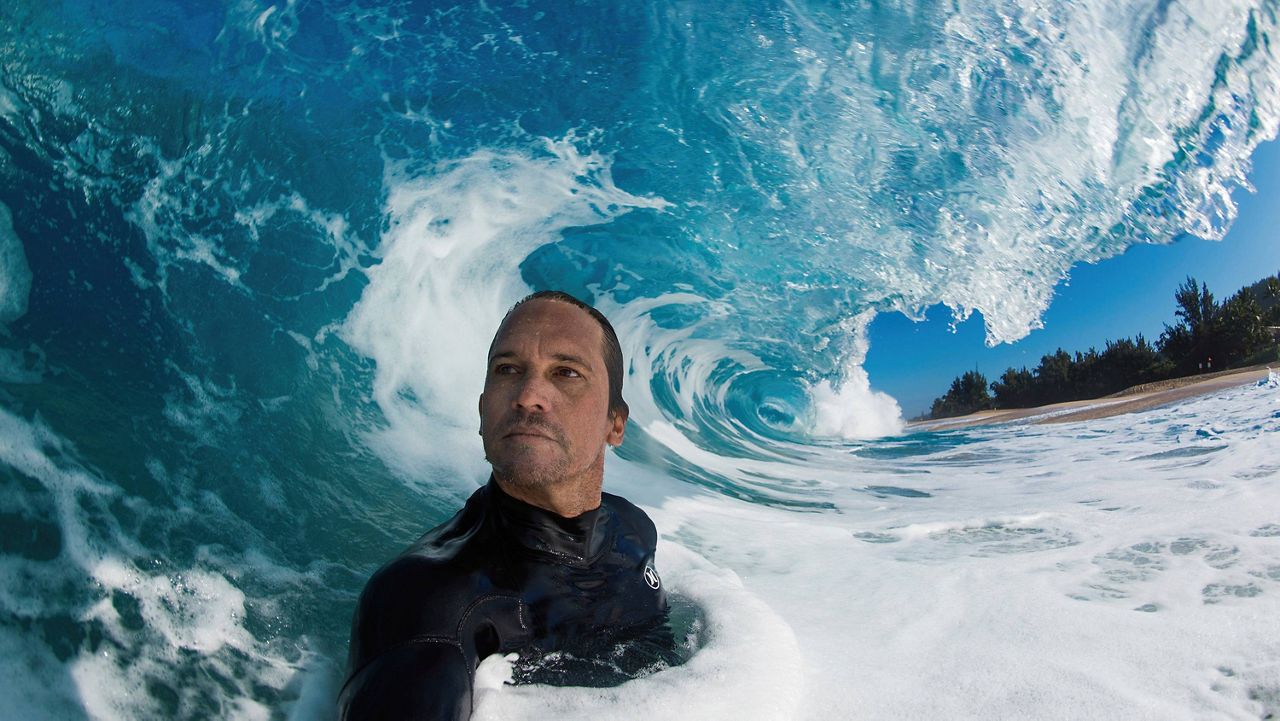 Clark Little takes a selfie as he photographs waves on the North Shore of Oahu near Haleiwa, Hawaii. (Clark Little via AP)