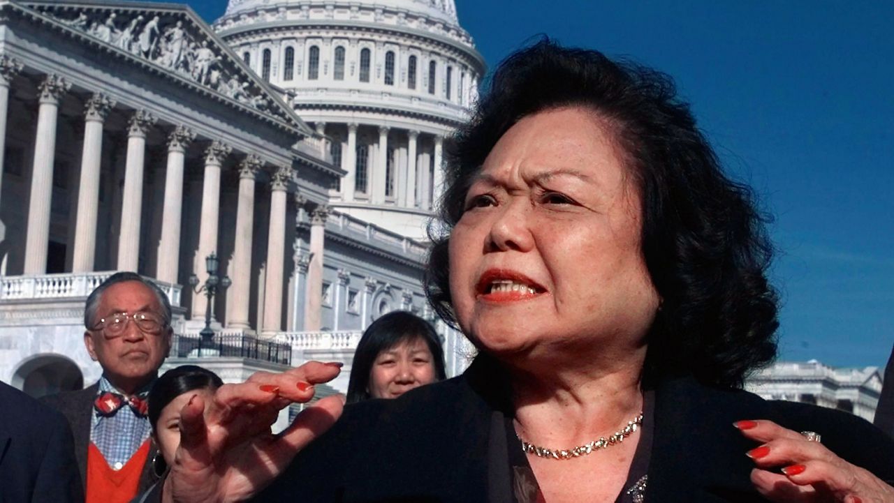 Rep. Patsy Mink meets reporters on Capitol Hill in 1997. (AP Photo/Joe Marquette)